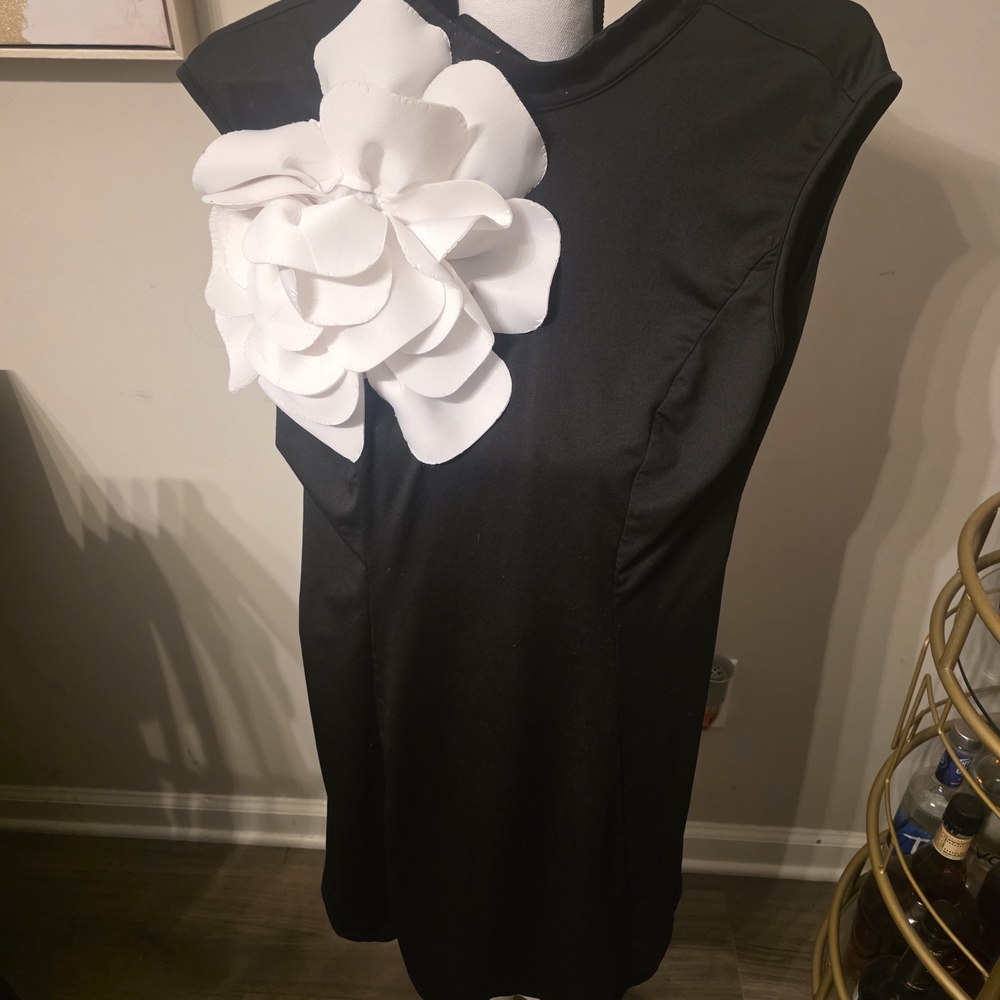Black Sleeveless Dress with White Floral Accent